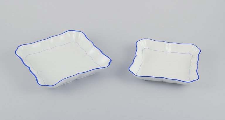 Meissen, Germany. Two square bowls of white porcelain, blue rim.