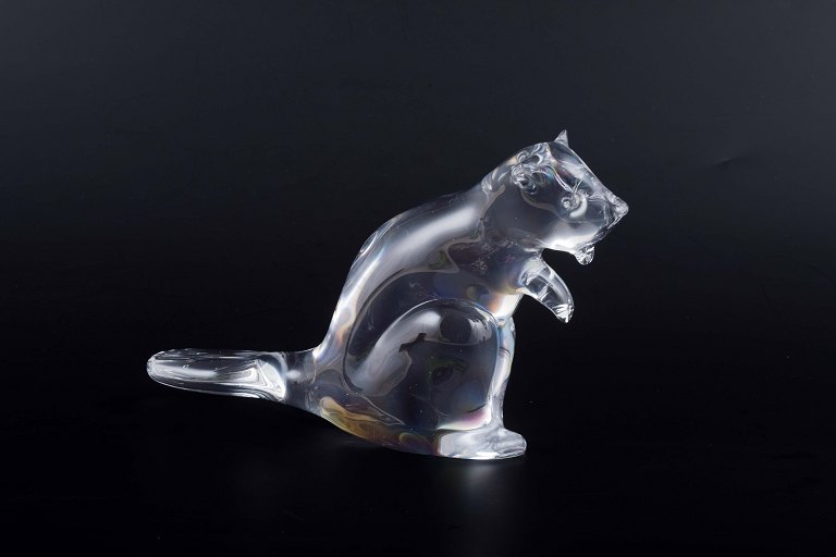 Glass sculpture in the shape of an otter, executed in clear glass with fine 
light refractions. The piece is signed on the base: FH, Ronneby Sweden.