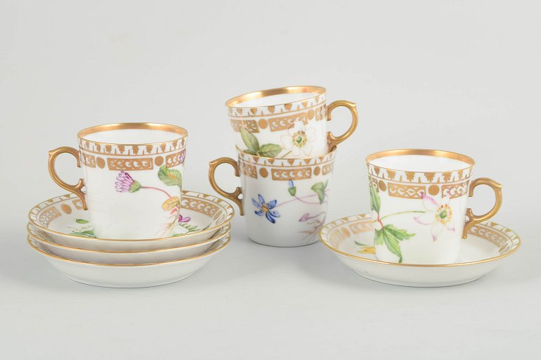 Royal Copenhagen, set of 4 demitasse cups with matching saucers.