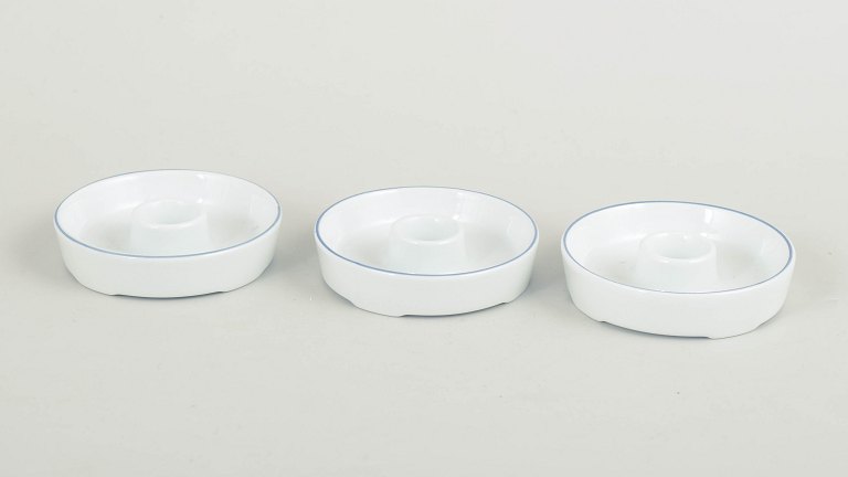 Grethe Meyer for Royal Copenhagen, set of three small Blue Line candlesticks.