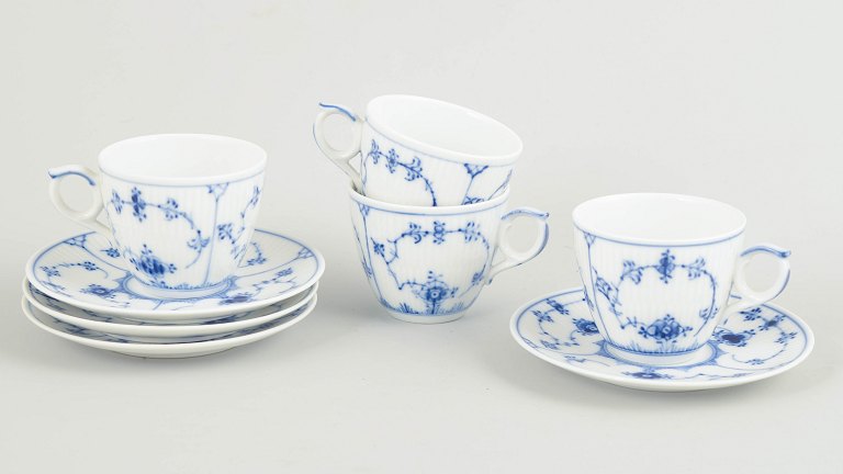 Royal Copenhagen Blue Fluted Plain, set of four demitasse cups with matching saucers.