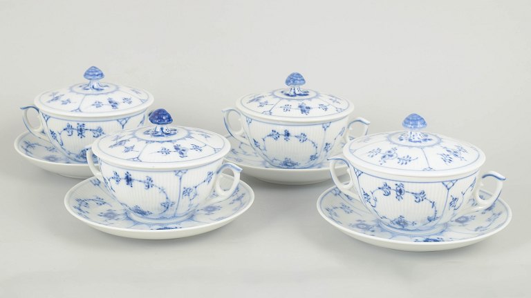 Royal Copenhagen, Blue Fluted Plain set of four bouillon cups with saucers.