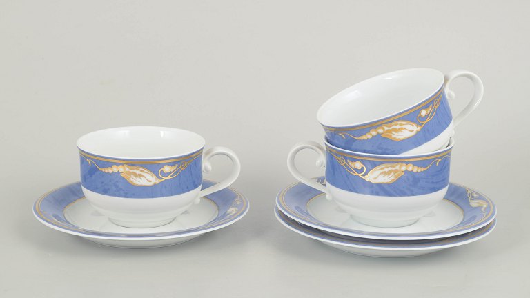 Royal Copenhagen Blue Magnolia, set of three teacups with matching saucers.