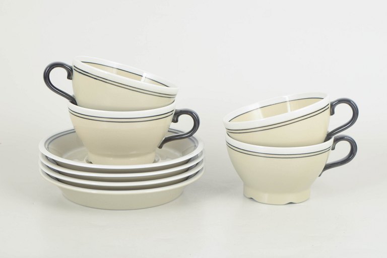 Jackie Lynd for Rörstrand, set of four teacups with matching saucers “Nocturne”.