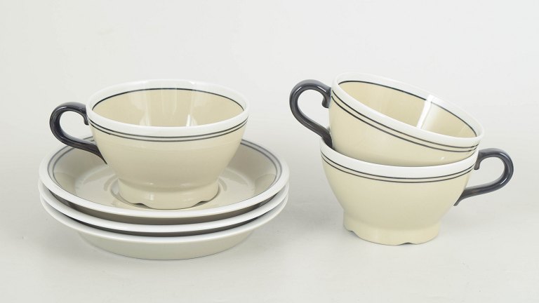 Jackie Lynd for Rörstrand, set of three teacups with matching saucers “Nocturne”.