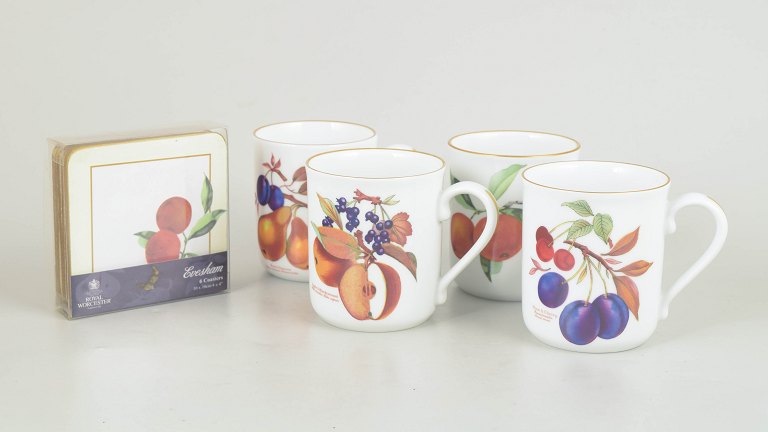 Royal Worcester Evesham, set of four mugs and set of six coasters.