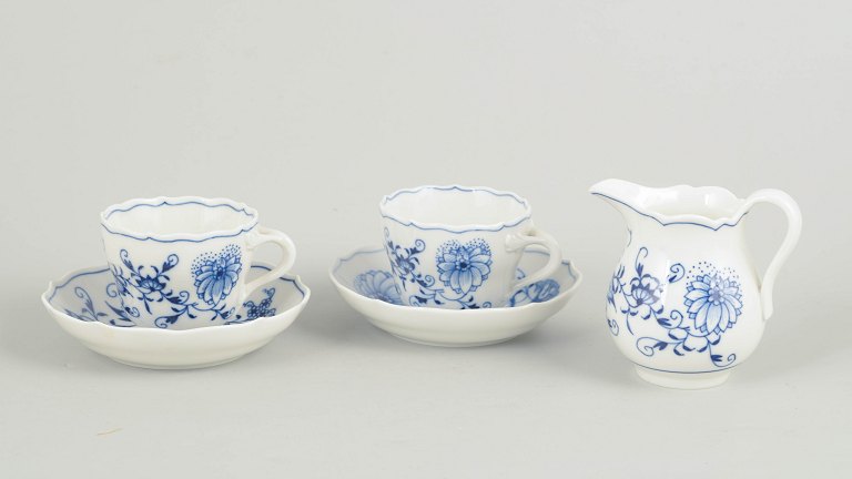 Meissen Blue Onion, set of two demitasse cups with matching saucers and creamer.