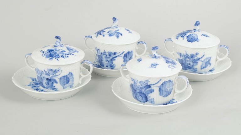 Royal Copenhagen Blue Flower Curved, set of four bouillon cups with matching saucers.