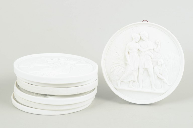 Bing & Grøndahl, set of seven biscuit wall plaques after Thorvaldsen.