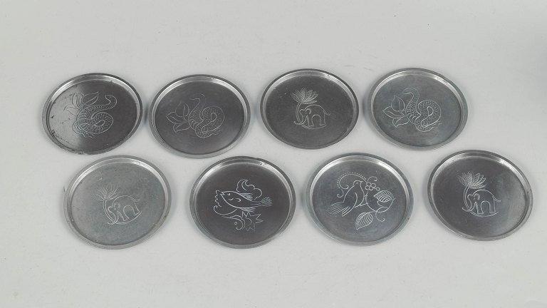 Just Andersen, set of eight coasters in pewter.