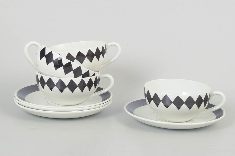 Karin Björquist for Gustavsberg, set of four teacups with matching saucers “Svart Ruter”.