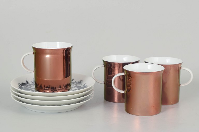 Bjørn Wiinblad for Rosenthal, set of four coffee cups with matching saucers.