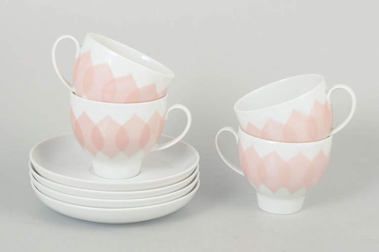Bjørn Wiinblad for Rosenthal, set of four coffee cups with matching saucers.