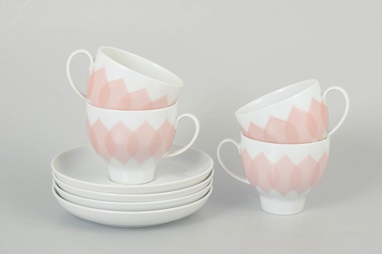 Bjørn Wiinblad for Rosenthal, set of four coffee cups with matching saucers.