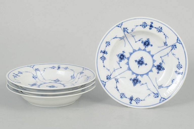 Royal Copenhagen Blue Fluted Plain, set of four deep plates.