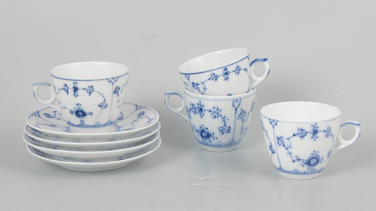 Royal Copenhagen Blue Fluted Plain, set of four coffee cups with matching saucers.