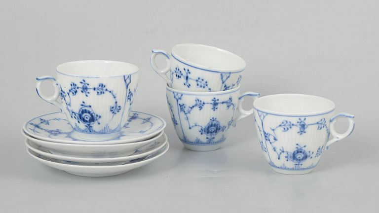Royal Copenhagen Blue Fluted Plain, set of four coffee cups with matching saucers.