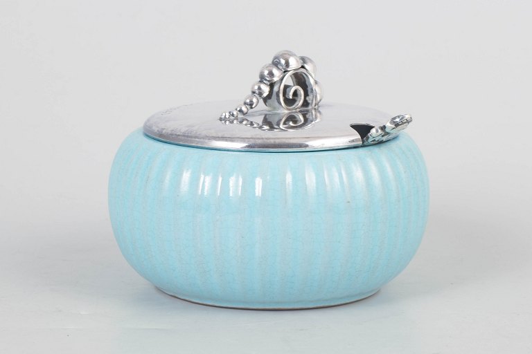 Danish jam jar with silver-plated lid and Georg Jensen Acorn sterling silver spoon.