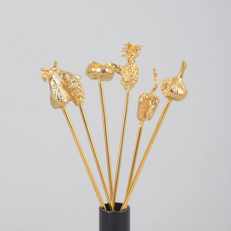 Skultuna, set of six cocktail sticks with fruit and vegetable motifs.