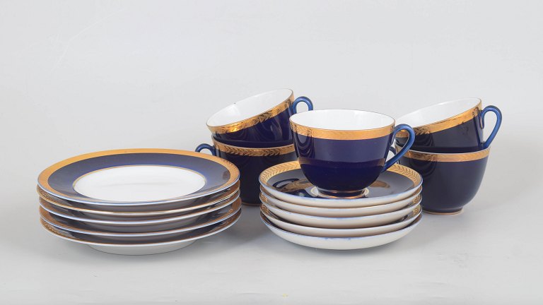 Lomonosov, set of five coffee cups with matching saucers and cake plates.