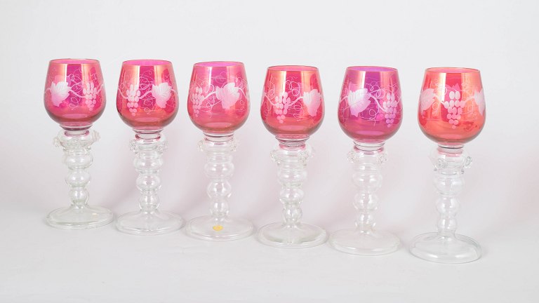 Set of six Bohemian red wine glasses.