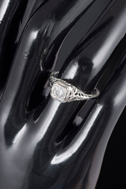 8 carat white gold ring with diamond.