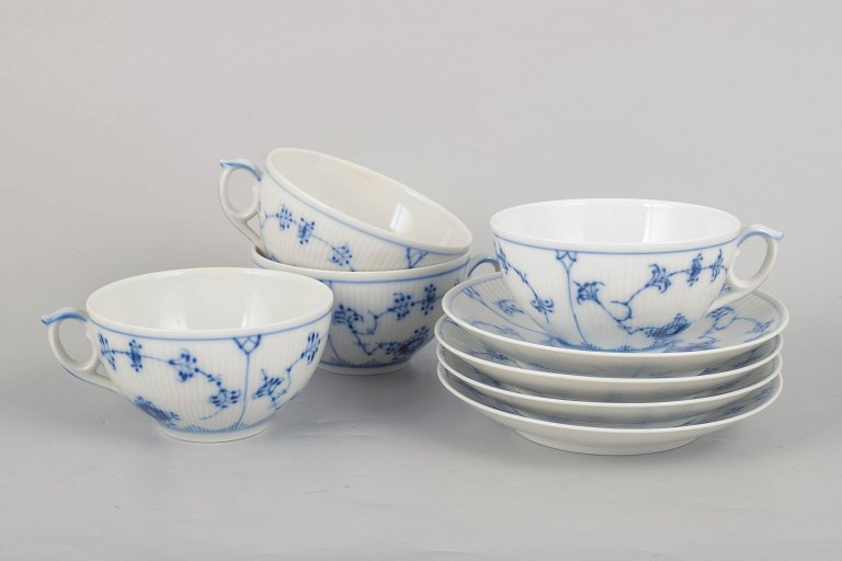 Royal Copenhagen Blue Fluted Plain, set of four teacups with matching saucers.