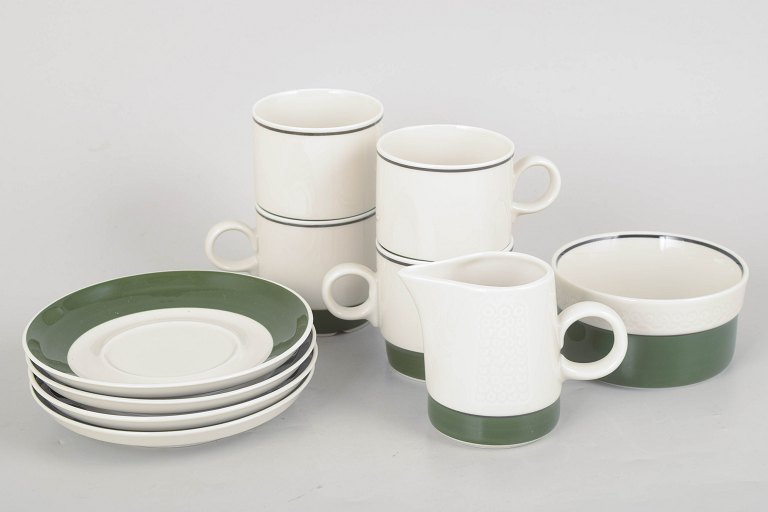 Olle Alberius for Rörstrand, set of four coffee cups with saucers, sugar bowl and creamer.