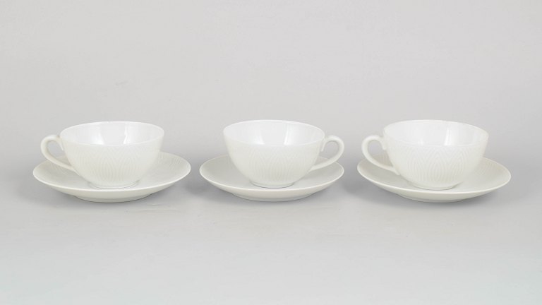 Axel Salto for Royal Copenhagen, set of three teacups with matching saucers.