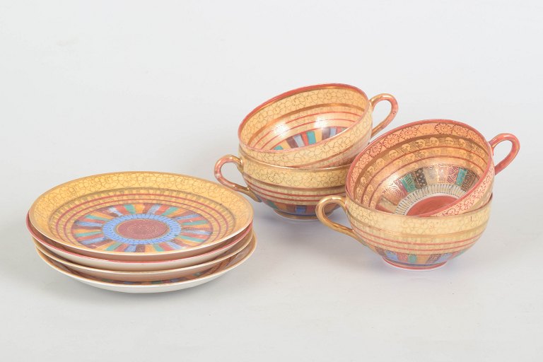 Japanese Kutani Art Deco, set of four teacups with matching saucers.