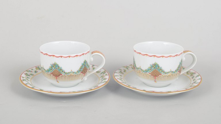 Royal Copenhagen Christmas Joy, pair of coffee cups with saucers.