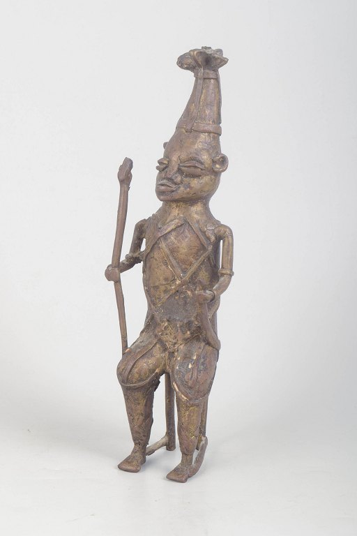 Nigeria, probably Edo/Benin cultural sphere. Bronze figure of a warrior or royal messenger. 20th century.