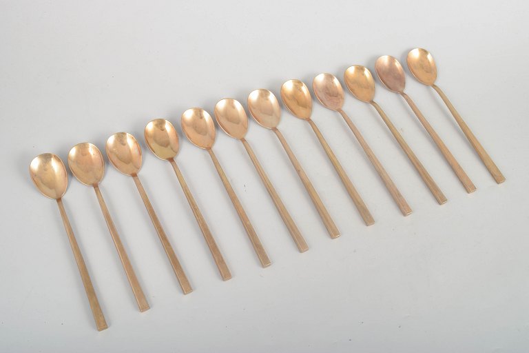 Sigvard Bernadotte for Scanline, set of twelve bronze caffè latte spoons.