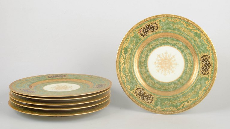 Hutschenreuther, set of six large gilded dinner plates.