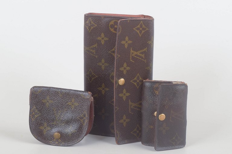 Louis Vuitton, key holder and two wallets.